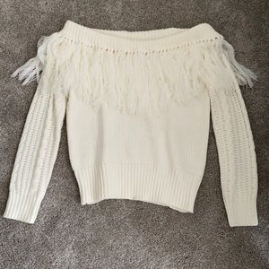 &MERCI Off-Shoulder Fringe Sweater